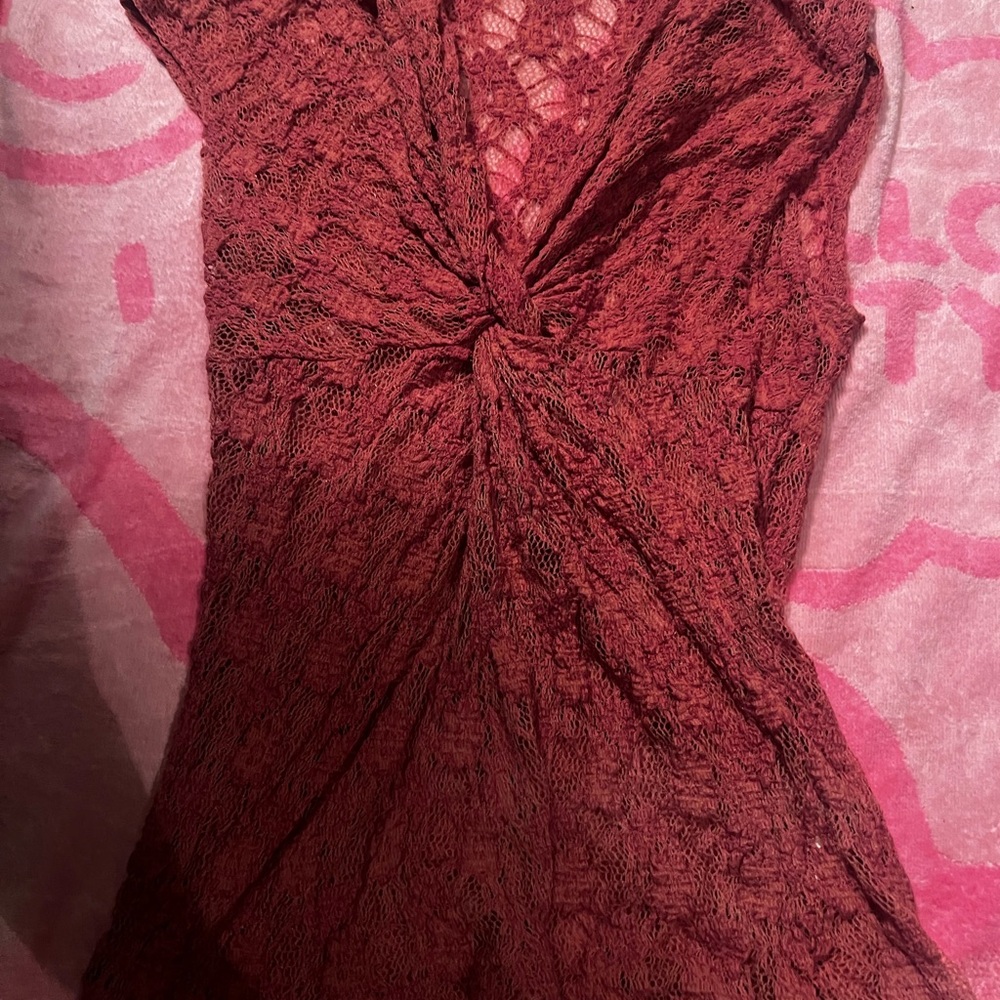 Elegant pink lace top.. pairs well with tank top under!